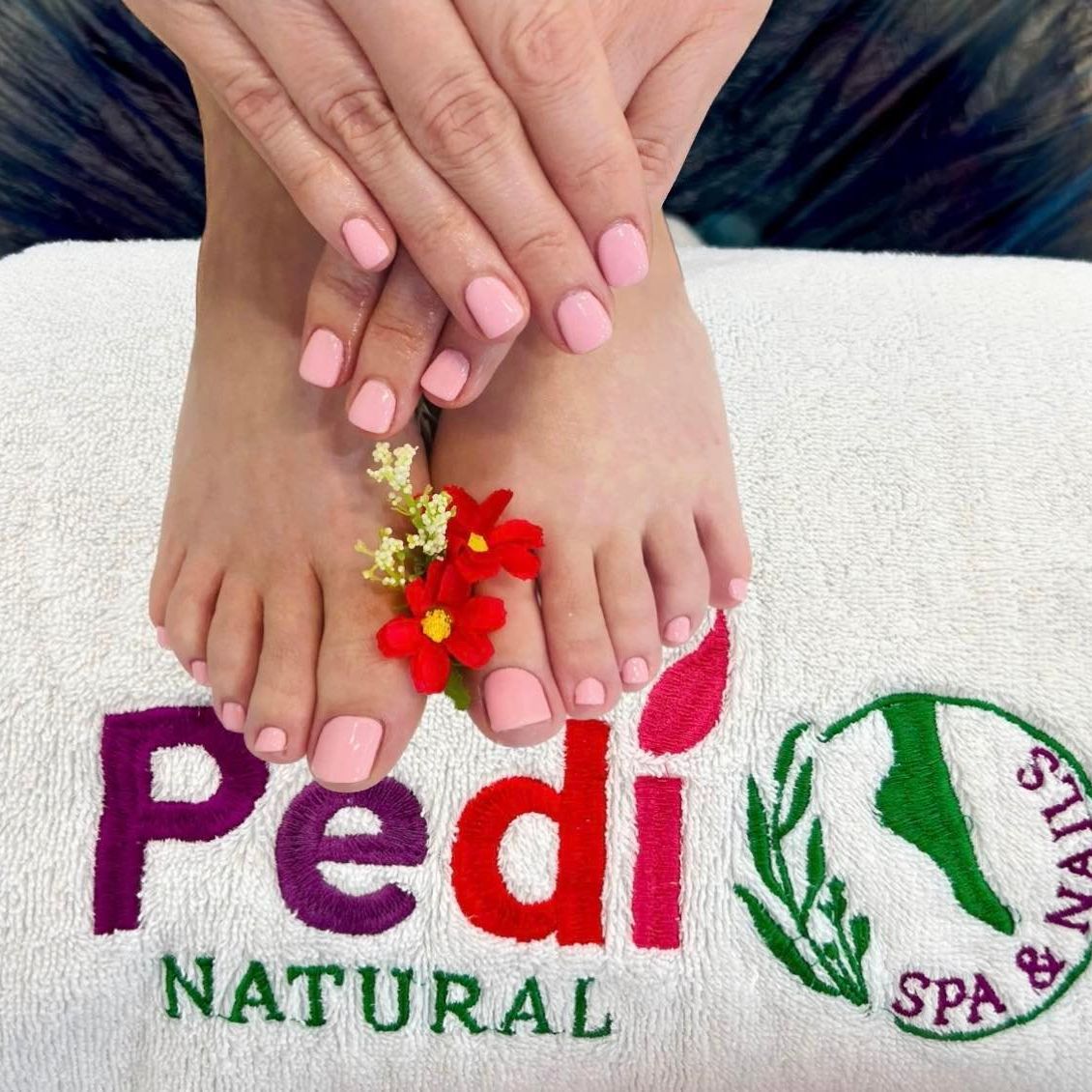 A finished pedicure on a Pedi Natural Spa towel